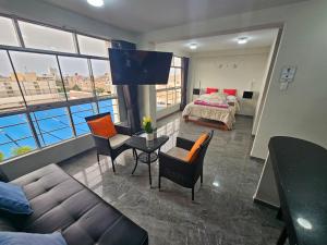 O zonă de relaxare la Apartamentos "APPART D'ELIETTE"