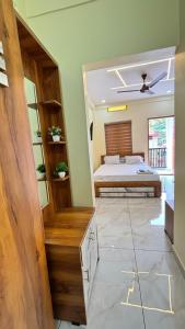 Postel nebo postele na pokoji v ubytování Hawa Residency