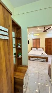 Postel nebo postele na pokoji v ubytování Hawa Residency