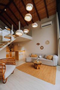 a living room with a couch and a table at DD's Roof Villas in Ardeşen +49 photos