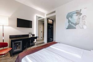 TV a/nebo společenská místnost v ubytování Hotel Continental
