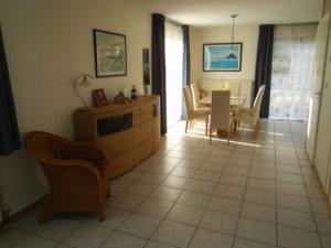 Et opholdsområde på Lovely bungalow with garden