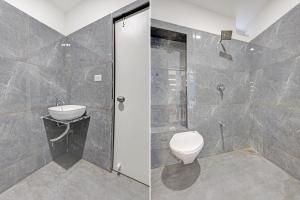 Koupelna v ubytování Hotel O Reet Villa