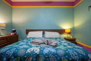 Una cama o camas en una habitación de Casa Juarez B&B