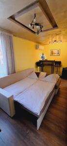 Posteľ alebo postele v izbe v ubytovaní Apartman Motorcycle friendly Osijek