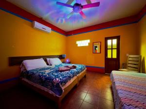 Una cama o camas en una habitación de Casa Juarez B&B