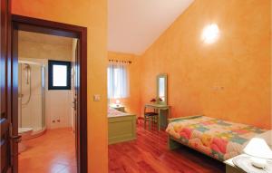 Posteľ alebo postele v izbe v ubytovaní Nice Home In Golubovo With Kitchen