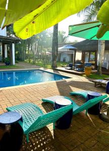 Bazén v ubytování Hotel Casa Paradiso Guarujá nebo v jeho okolí