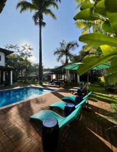 Bazén v ubytování Hotel Casa Paradiso Guarujá nebo v jeho okolí