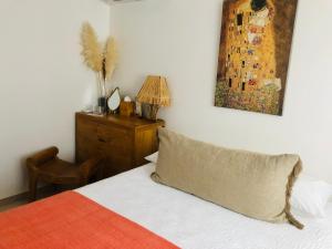 Postel nebo postele na pokoji v ubytování Chambre Manava