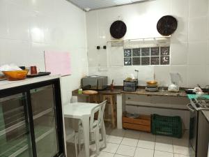 Kuchyň nebo kuchyňský kout v ubytování Hostel Espaço Mulher