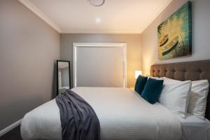 Devan House - An Entertainers' Retreat Close to Town客房内的一张或多张床位