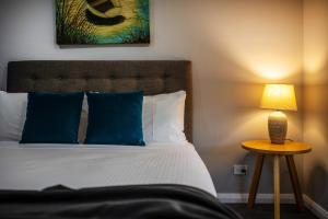 Devan House - An Entertainers' Retreat Close to Town客房内的一张或多张床位