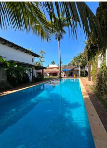 Bazén v ubytování Hotel Casa Paradiso Guarujá nebo v jeho okolí