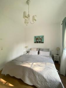 Katil atau katil-katil dalam bilik di Woodhaus Appartement