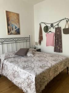 Postel nebo postele na pokoji v ubytování Rifugio al Borgo