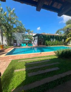 Bazén v ubytování Hotel Casa Paradiso Guarujá nebo v jeho okolí