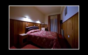 Voodi või voodid majutusasutuse Hotel Bitouni toas