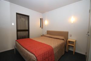 Postel nebo postele na pokoji v ubytování Bentleys Motor Inn