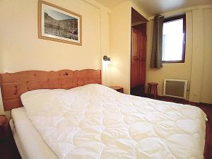 Postel nebo postele na pokoji v ubytování Terrasses E 206 PARC NAT VANOISE appart 6 pers