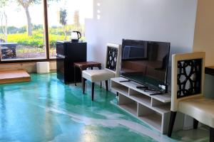TV a/nebo společenská místnost v ubytování Hotel KAZENOIRO