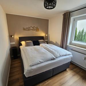Postel nebo postele na pokoji v ubytování Alpensternchen + 14 fotografií