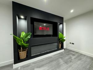 Μια τηλεόραση ή/και κέντρο ψυχαγωγίας στο PE2 - 2 Bed 2 Bath - Self Check-In - Free Wifi - Off Road Parking