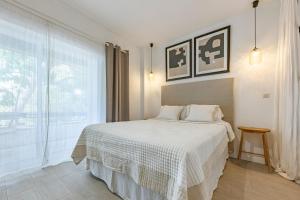 Postel nebo postele na pokoji v ubytování Apartamento en Milla de Oro a 5 min andando de la playa