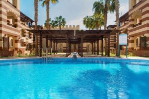 The swimming pool at or close to Marina Resort Port Ghalib, a member of Radisson Individuals