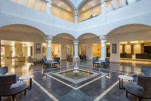 A seating area at Marina Resort Port Ghalib, a member of Radisson Individuals