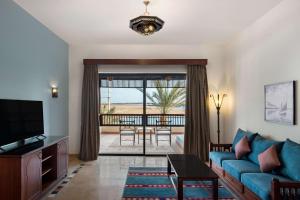 A television and/or entertainment centre at Marina Resort Port Ghalib, a member of Radisson Individuals