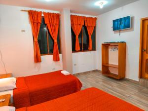 Postel nebo postele na pokoji v ubytování Suites en el Centro