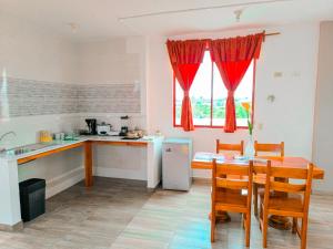 Kuchyň nebo kuchyňský kout v ubytování Suites en el Centro