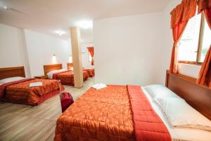 Postel nebo postele na pokoji v ubytování Suites en el Centro