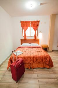 Postel nebo postele na pokoji v ubytování Suites en el Centro