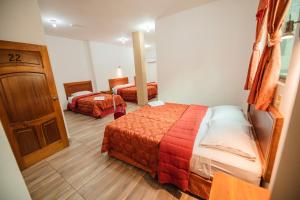 Postel nebo postele na pokoji v ubytování Suites en el Centro
