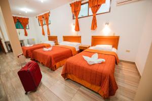 Postel nebo postele na pokoji v ubytování Suites en el Centro