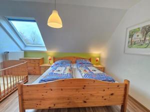 Postel nebo postele na pokoji v ubytování Ferienhaus Herkommer Norddeich