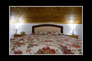 Voodi või voodid majutusasutuse Hotel Bitouni toas