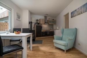 Kuchyň nebo kuchyňský kout v ubytování Ferienhaus-Sternchen-2-am-Schwarzer-See + 13 fotografií