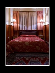 Voodi või voodid majutusasutuse Hotel Bitouni toas
