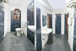 a bathroom with a sink and a toilet at The GingerGrass in Shimla