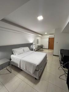 Postel nebo postele na pokoji v ubytování Loft 3 Edf Celita Franca Business e flat