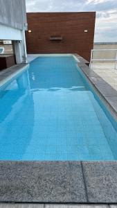 Bazén v ubytování Loft 3 Edf Celita Franca Business e flat nebo v jeho okolí