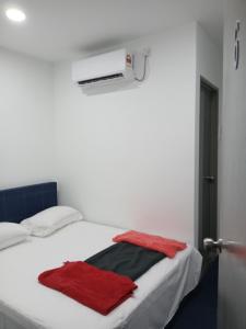 Postel nebo postele na pokoji v ubytování Enviropath Hotel