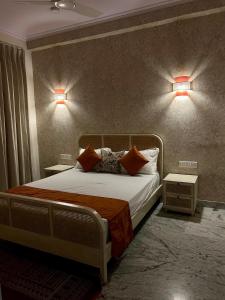 Ένα ή περισσότερα κρεβάτια σε δωμάτιο στο The Little Experience, Jaipur
