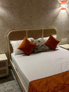 Ένα ή περισσότερα κρεβάτια σε δωμάτιο στο The Little Experience, Jaipur