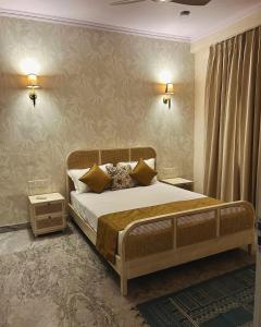 Ένα ή περισσότερα κρεβάτια σε δωμάτιο στο The Little Experience, Jaipur