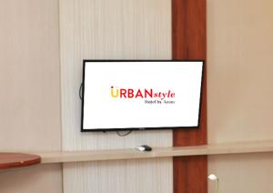 Televiisor ja/või meelelahutuskeskus majutusasutuses Urban Style Hotel Lampung, Azana Hotels Collection