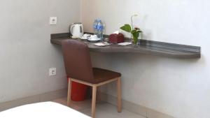 Voodi või voodid majutusasutuse Urban Style Hotel Lampung, Azana Hotels Collection toas